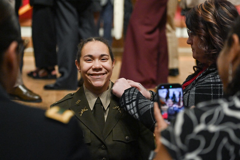 A beaming cadet receives her rank and becomes a 2nd Lieutenant in the U.S. Army.
