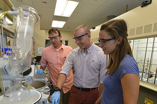 Professor and two cadets in lab