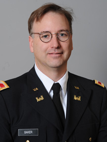 Col. J. Mac Baker, Ph.D.