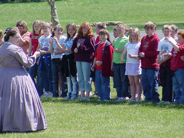 Docent giving a tour to school children