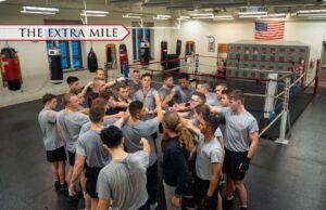 The VMI boxing club huddles up outside of the ring.