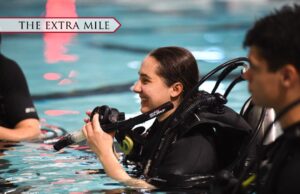 A cadet in the pool with scuba gear.