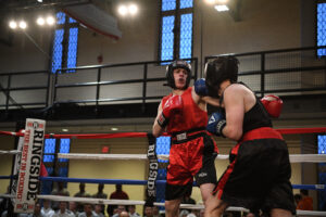 A VMI boxer in the ring fighting.