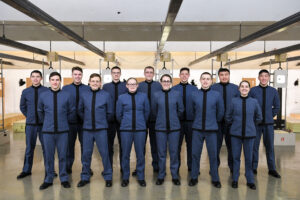 The VMI pistol team poses in the shooting range.