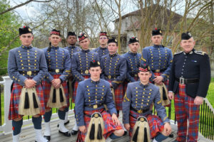 Members of the VMI pipe band prepare for the funeral of Mike Hill in Nashville, Tennessee.