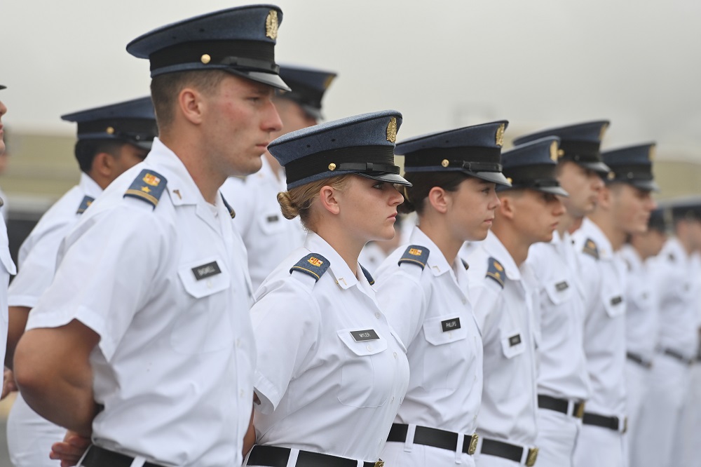 Cadets stand at attention.