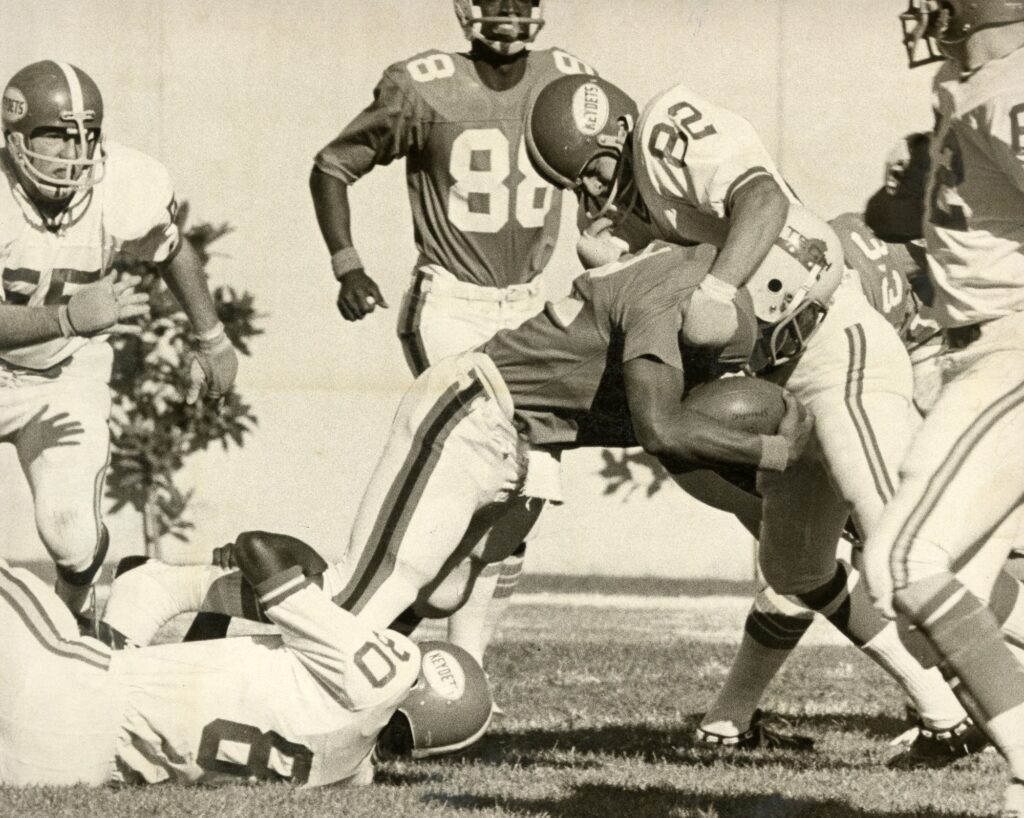 1973 VMI vs VPI football game, VMI lineback stops VPI runner