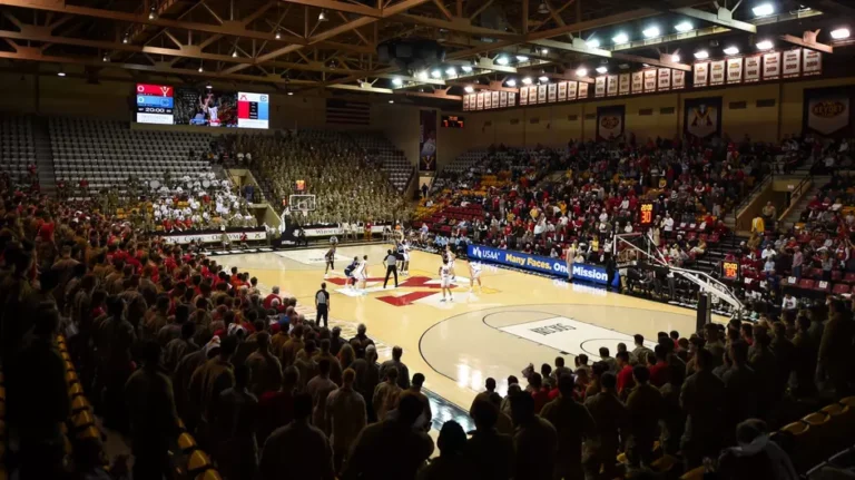 VMI basketball plays a game in Cameron Hall as the Corps of Cadets watches on.