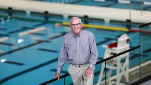 Richard “Dick” Goodall ’66 tours the VMI Aquatic Center in April 2026.—VMI Alumni Agencies Photo.