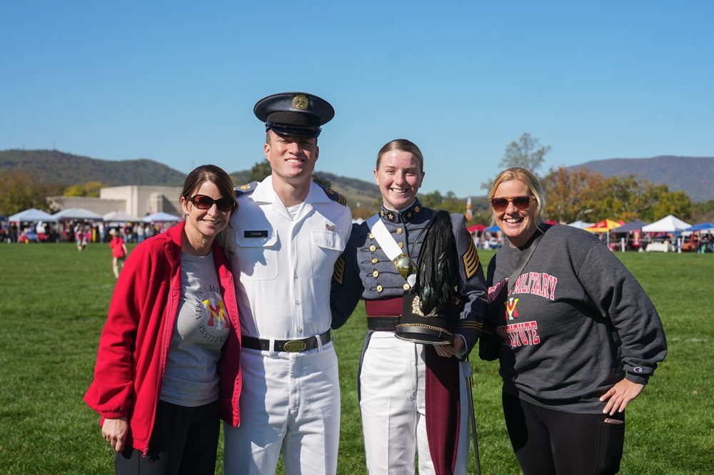 VMI cadets pose with family members during pre-game tailgating.