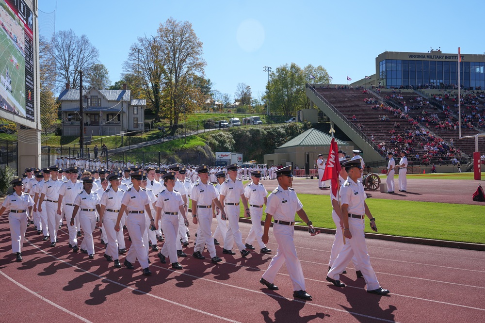 Cadets march into Foster Stadium.