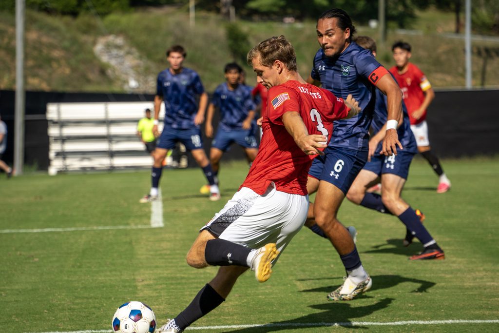 Jack Miller playing soccer for VMI.