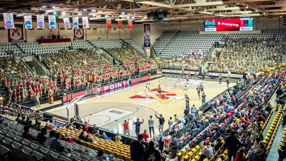 VMI basketball court with players and fans in attendance.