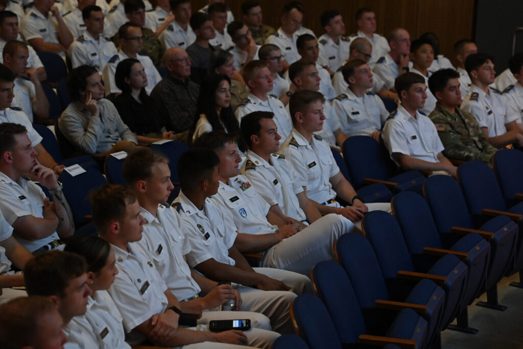 Cadets and others in the audience consider both sides of the argument in Gillis Theater during the Steamboat Institute debate Oct. 1.