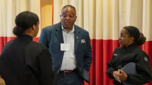 Keith Sykes ’89 speaks with cadets attending the Cadet–Alumni Career Networking Forum Sept. 26, 2026.